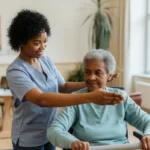 Young nurse helping older patient doing exercises for in nursing home